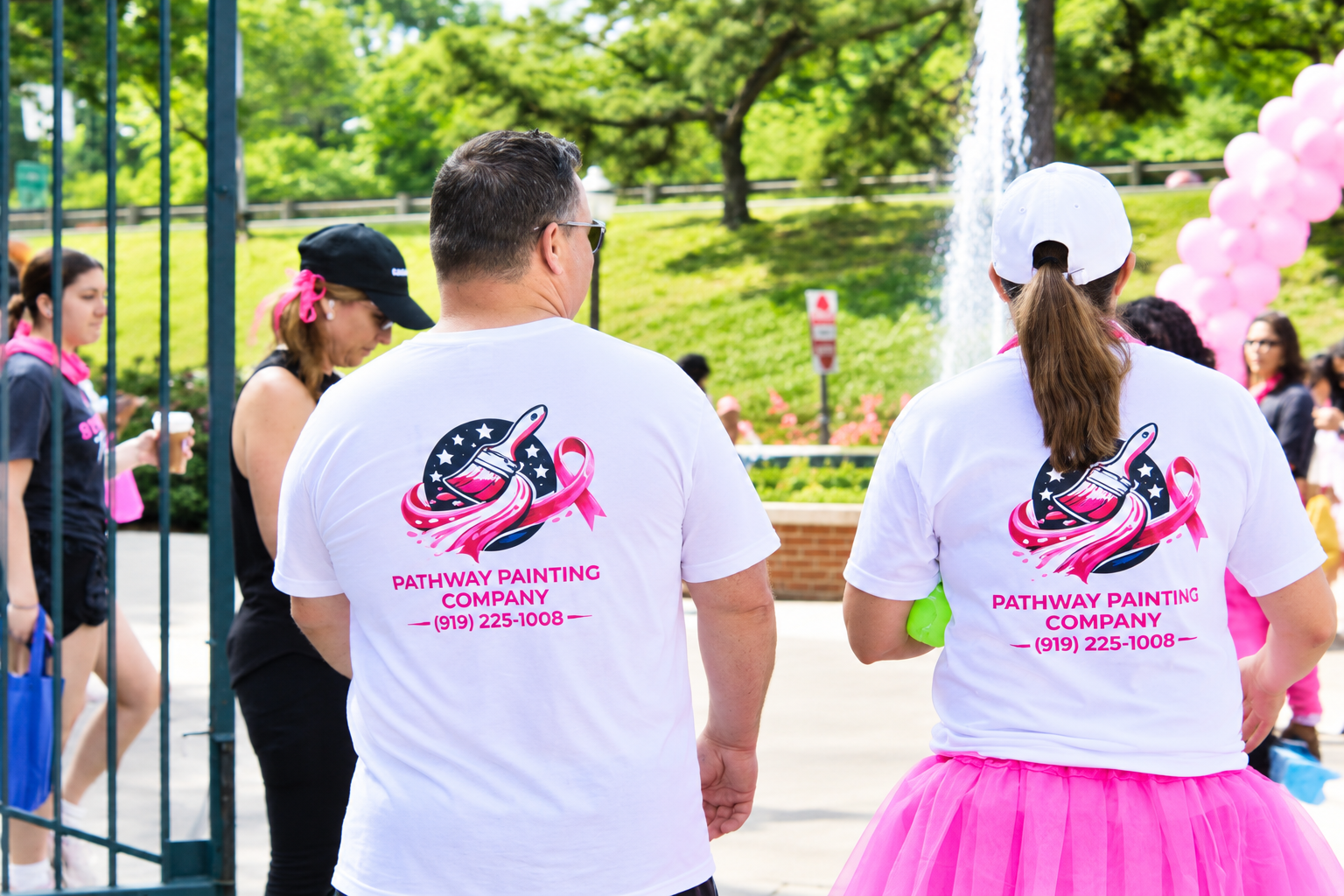 Participants wearing Pathway Painting pink-ribbon team shirts
